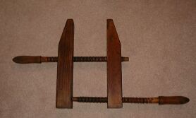 Whole of Aldrich and Hapgood wooden clamp 